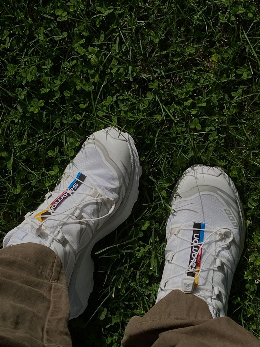 White Salomon XT-6 sneakers on grass, photo by @martaccapo via Pinterest
