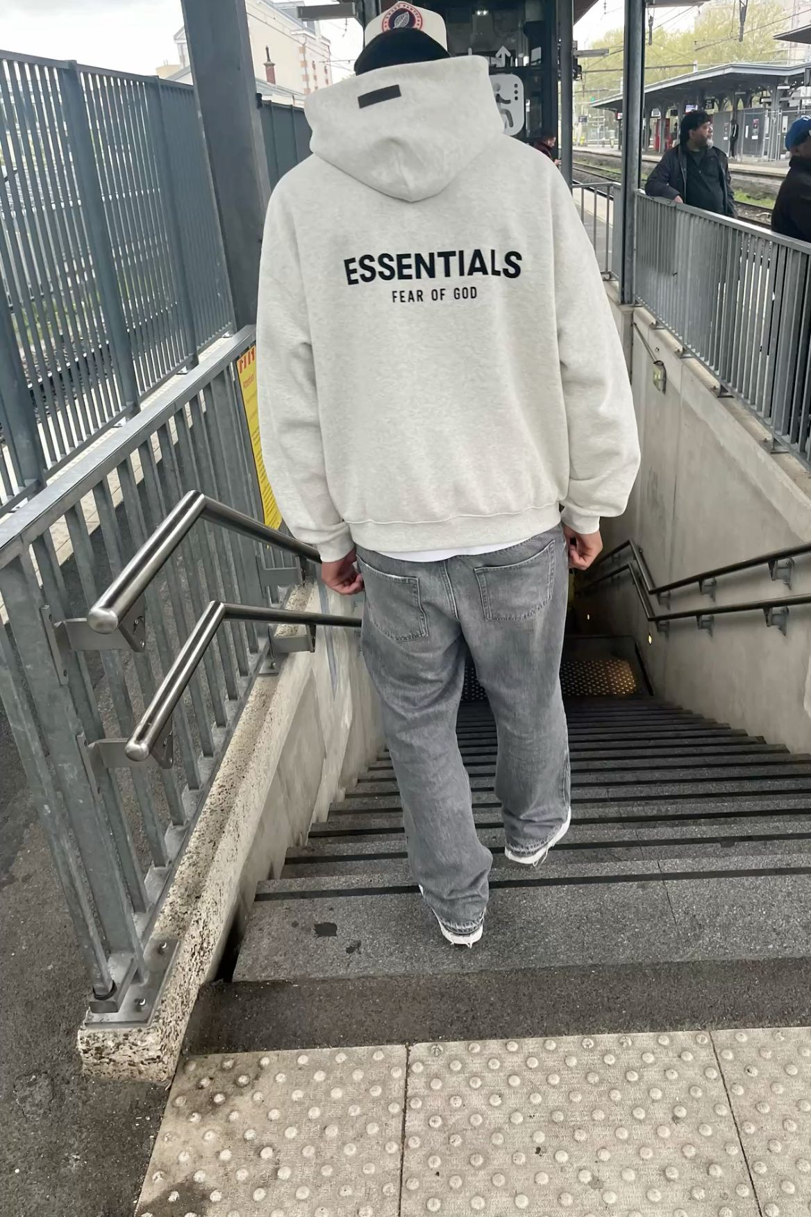 FOG Essentials hoodie worn with an oversized fit - photo by @stvnthegoat via Pinterest