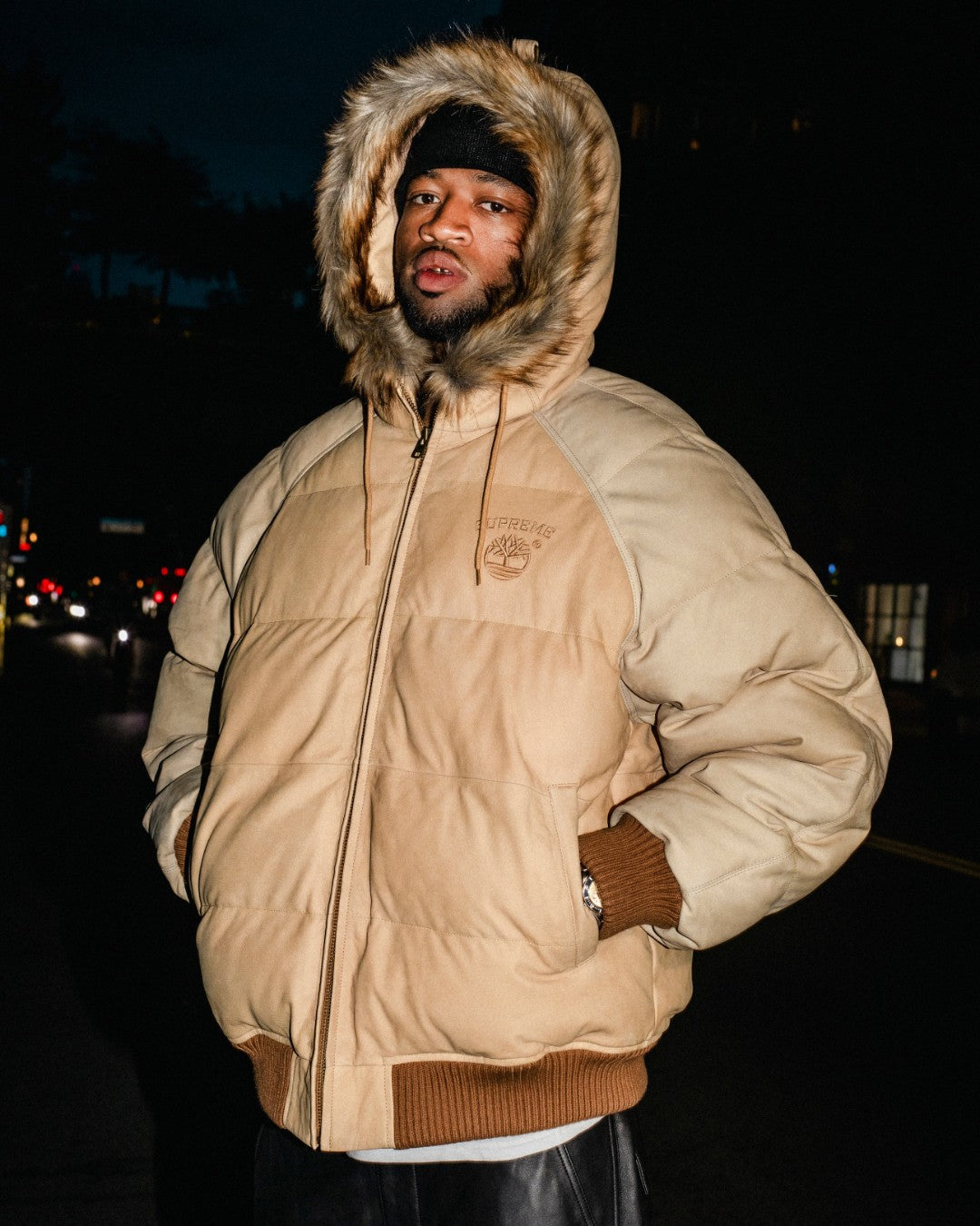 Supreme x Timberland Fall 2026 suede puffer jacket in wheat with fur-trimmed hood. Photo: @supremenewyork