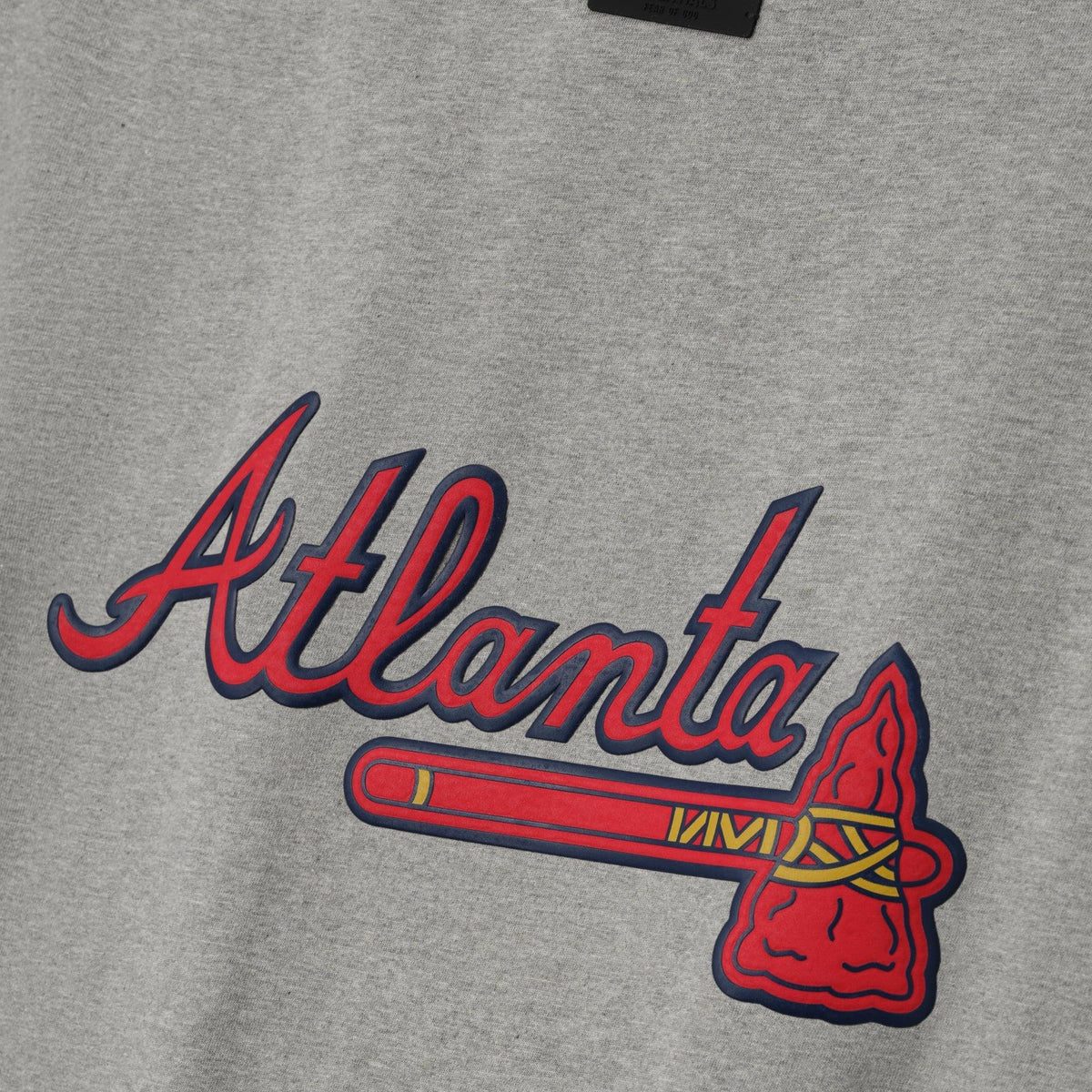 Fear of God Essentials Braves 90s Tee Dark Heather - Im Your Wardrobe