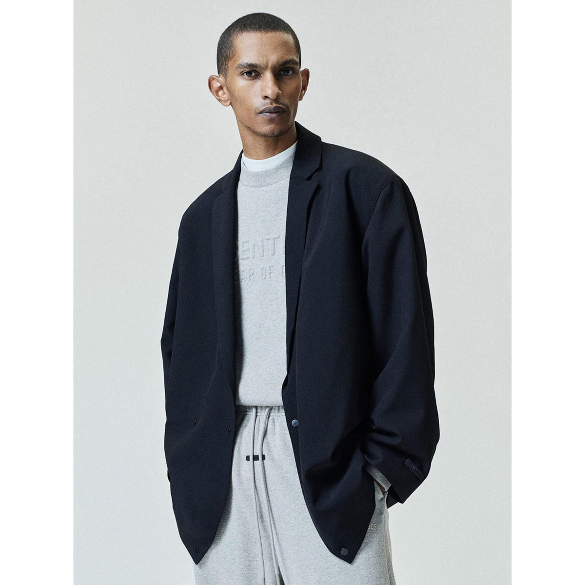 Fear of God Essentials Embossed FW26 90s Relaxed Crewneck Warm Heather - Im Your Wardrobe