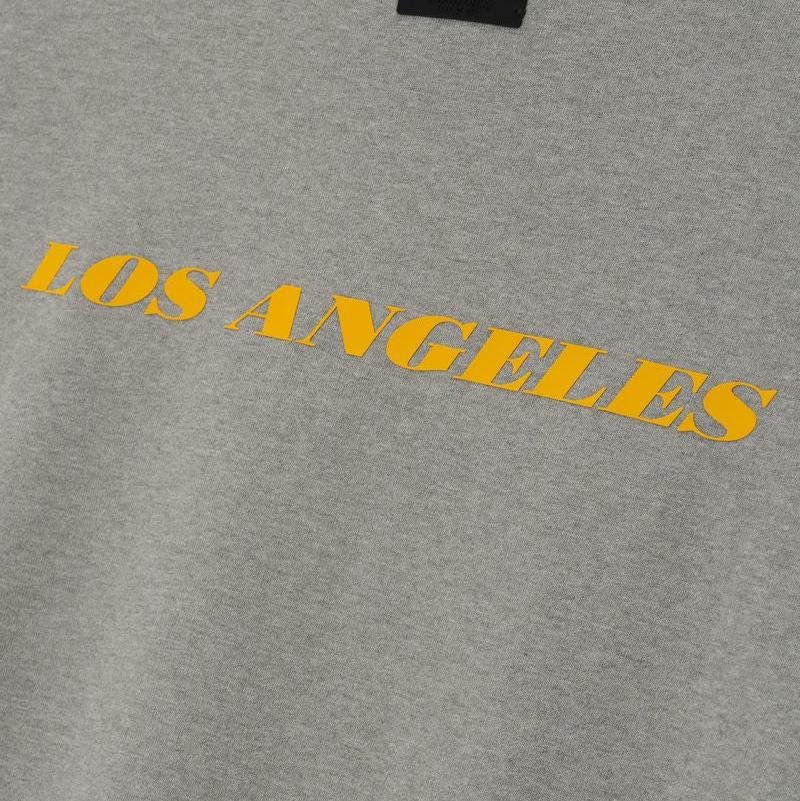 Fear of God Essentials Lakers 90s Tee Concrete Heather - Im Your Wardrobe