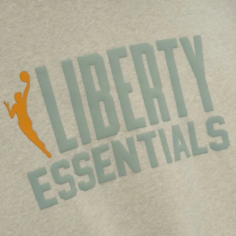 Fear of God Essentials Women's Liberty Classic Hoodie Heather Stone/ Aqua Sea - Im Your Wardrobe