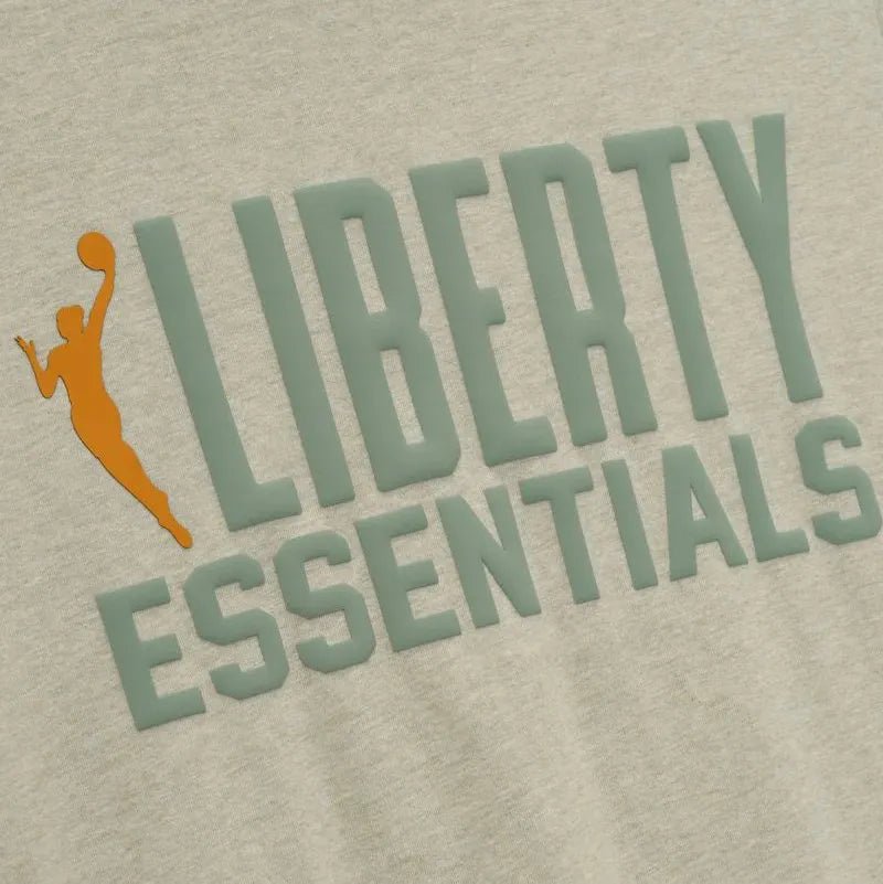 Fear of God Essentials Women's Liberty Classic Tee Heather Stone - Im Your Wardrobe