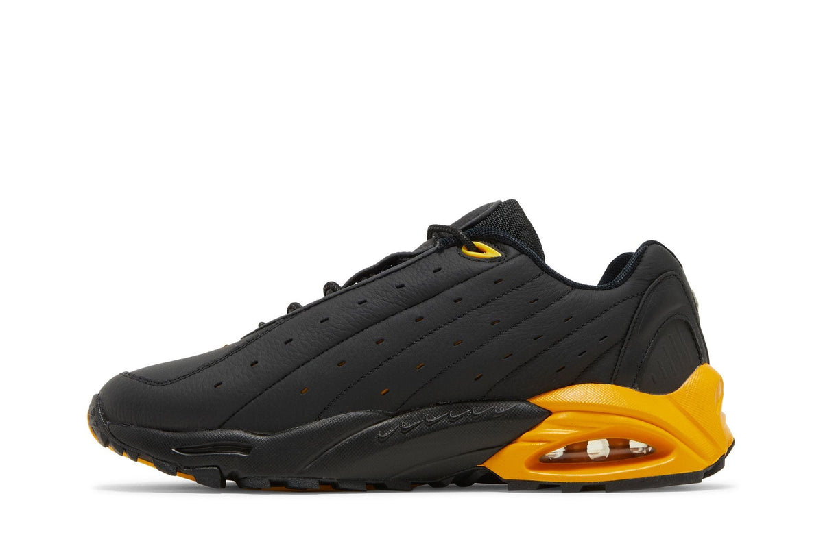 NOCTA x Nike Hot Step Air Terra Black University Gold - Im Your Wardrobe