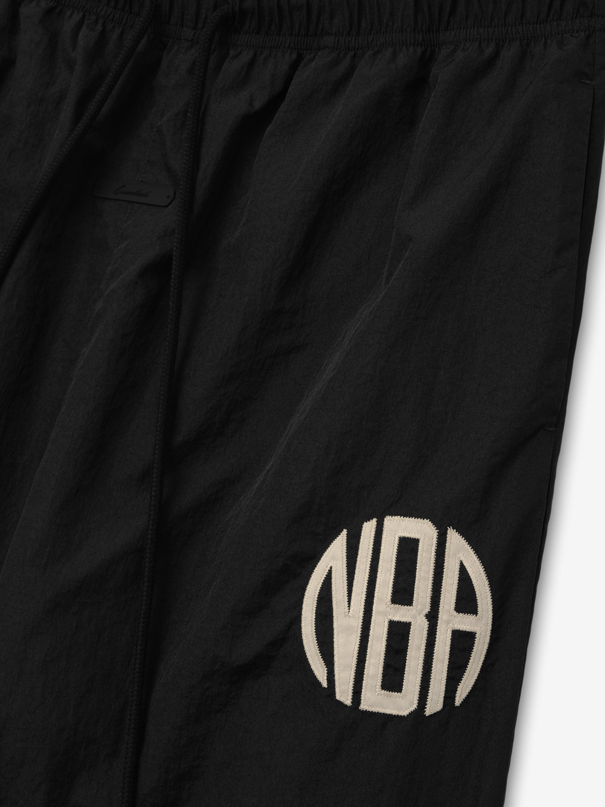 Fear of God Essentials NBA Slim Monogram Track Pant Black