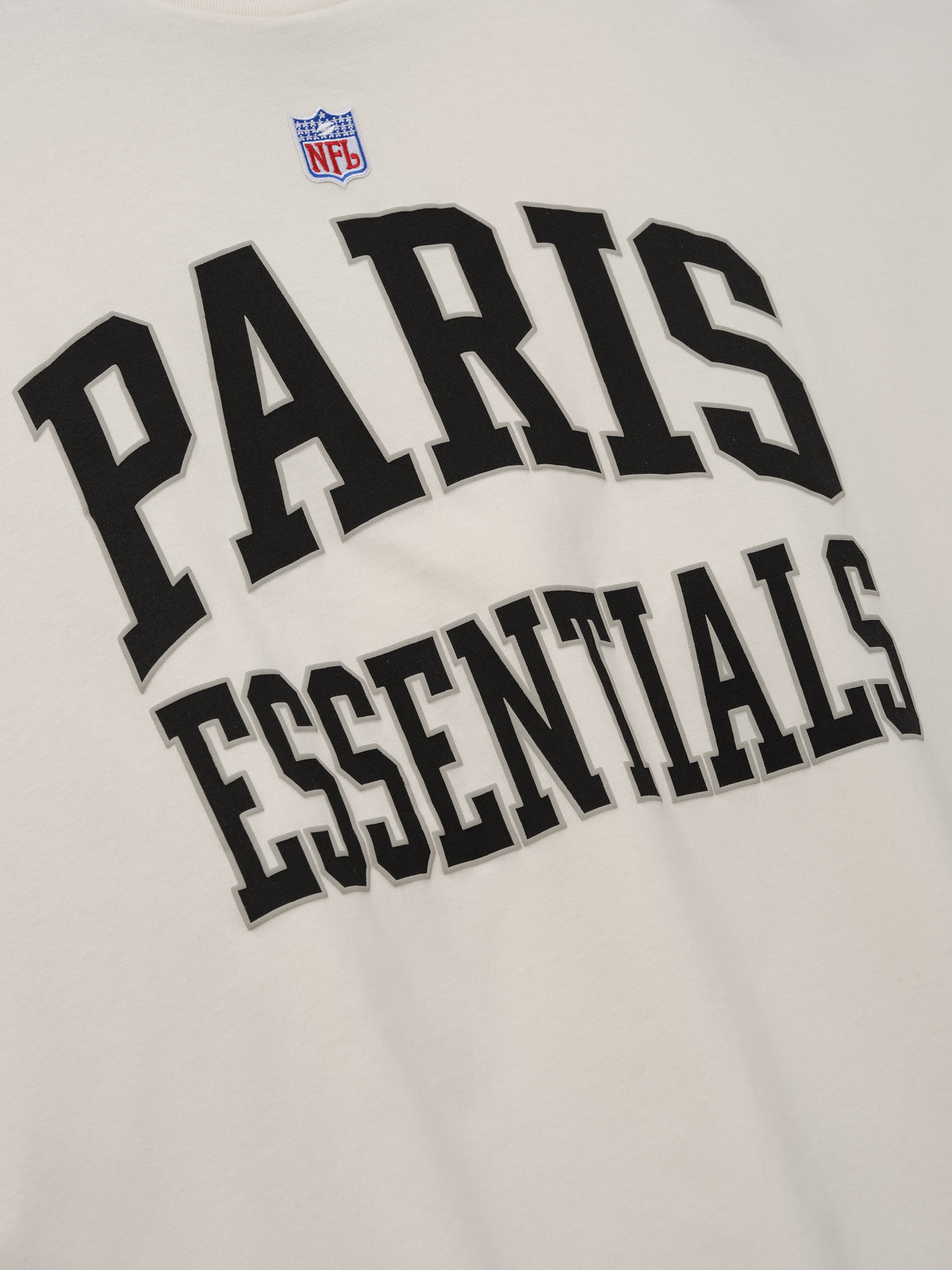 Fear of God Essentials NFL Paris Merch Tee Ivory