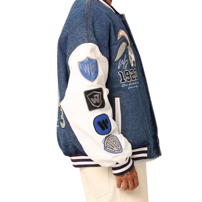 Buy American Thrift X Warner Bros. 100 Years Varsity Jacket in NZ Im