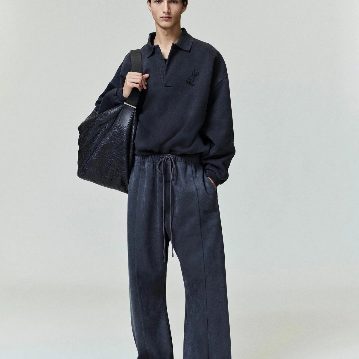 Fear of God Essentials Embroidered Classic Polo Sweatshirt Vintage Black - Im Your Wardrobe