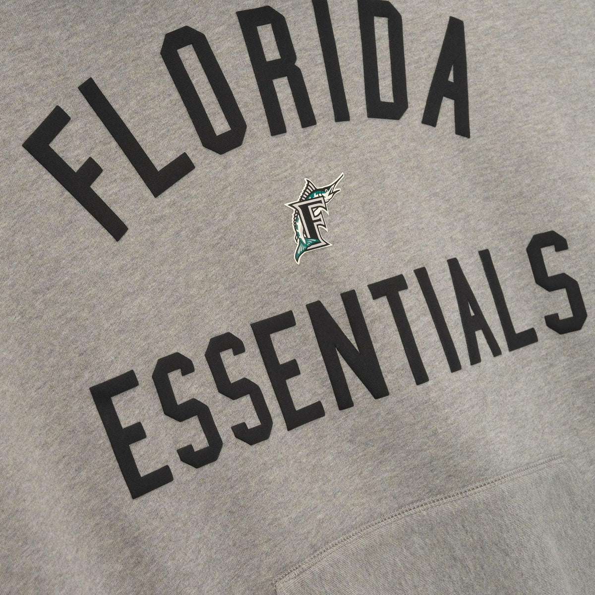 Fear of God Essentials Marlins Sport Hoodie Concrete Heather/Blk - Im Your Wardrobe
