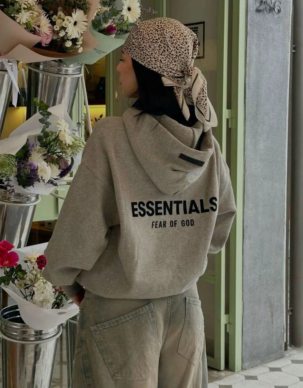 Fear of God Essentials hoodie, street style